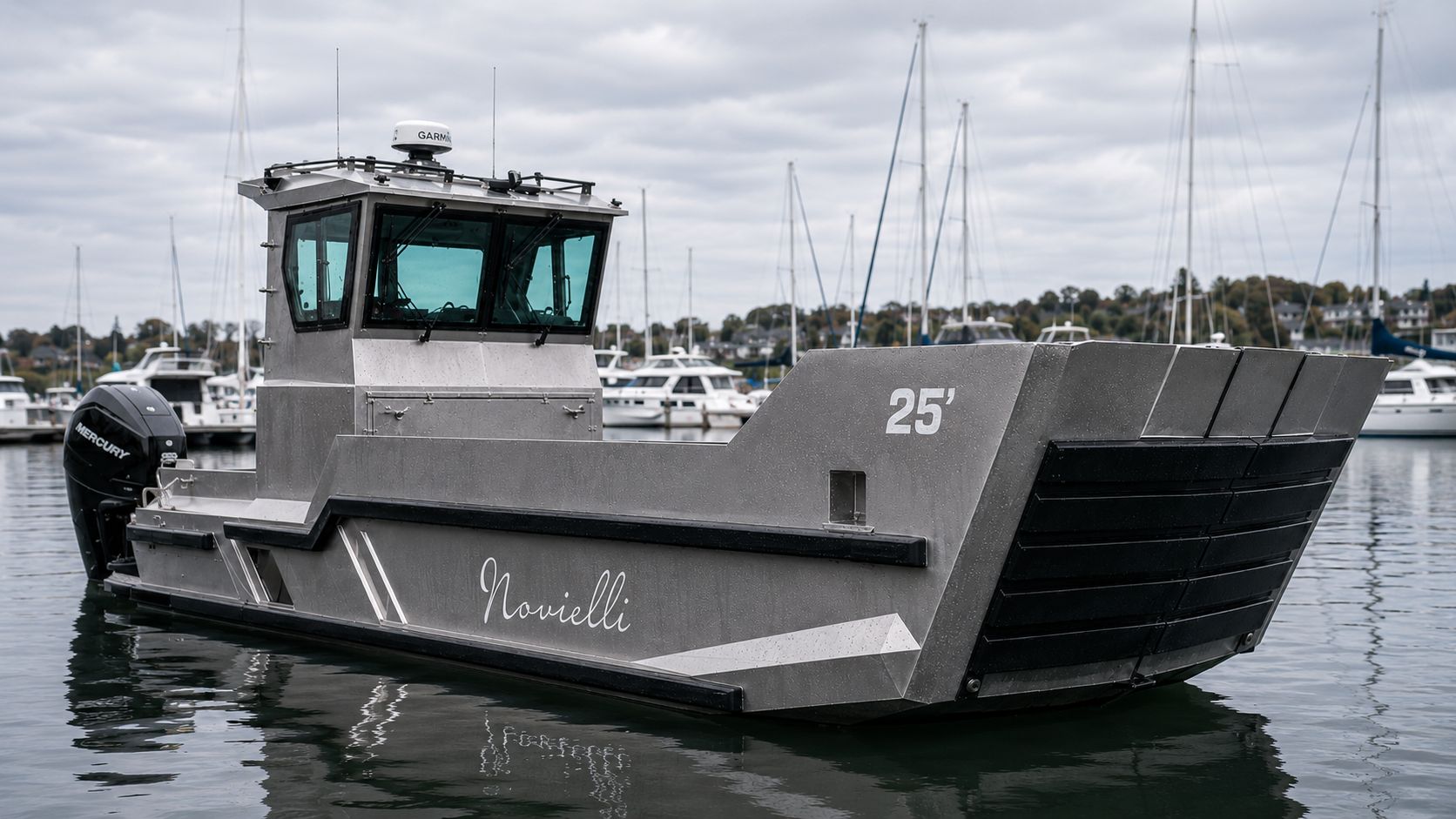 Bow-quarter view of the LC-259 M.U.L.E. landing craft at rest in a marina with raised bow door and pilothouse visible.