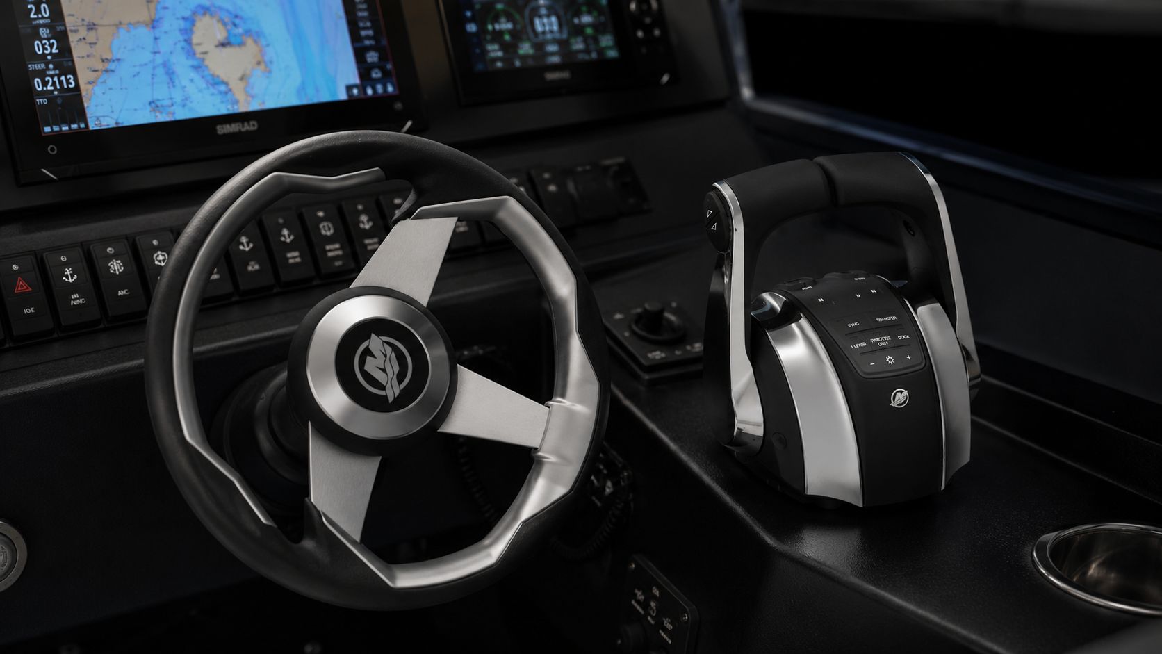 Detail of the Outlaw 559 LR helm — Novielli-branded brushed steering wheel with Mercury joystick controls and Simrad multifunction displays.