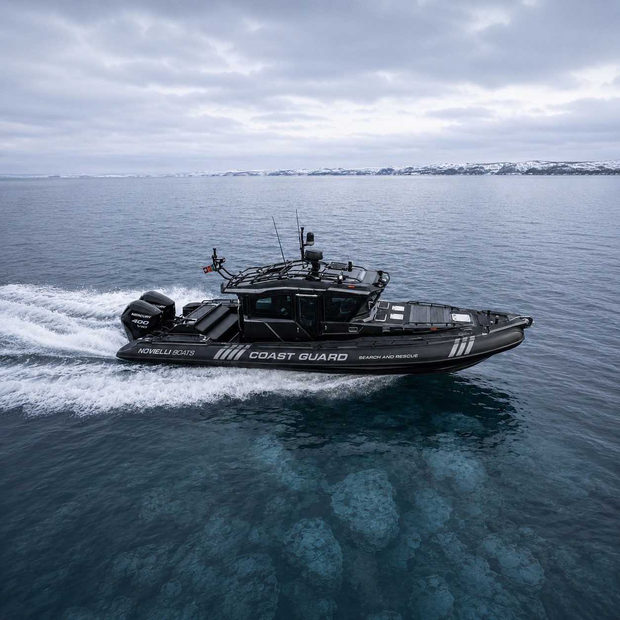 Novielli blacked-out Coast Guard search and rescue RIB with twin Mercury 400 V10 outboards running on cold northern waters.