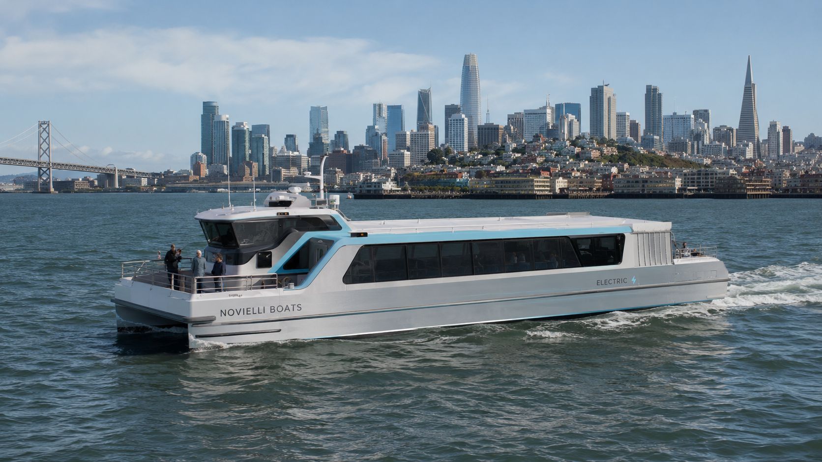 Novielli electric passenger ferry catamaran underway on San Francisco Bay with the city skyline and Bay Bridge in the background.