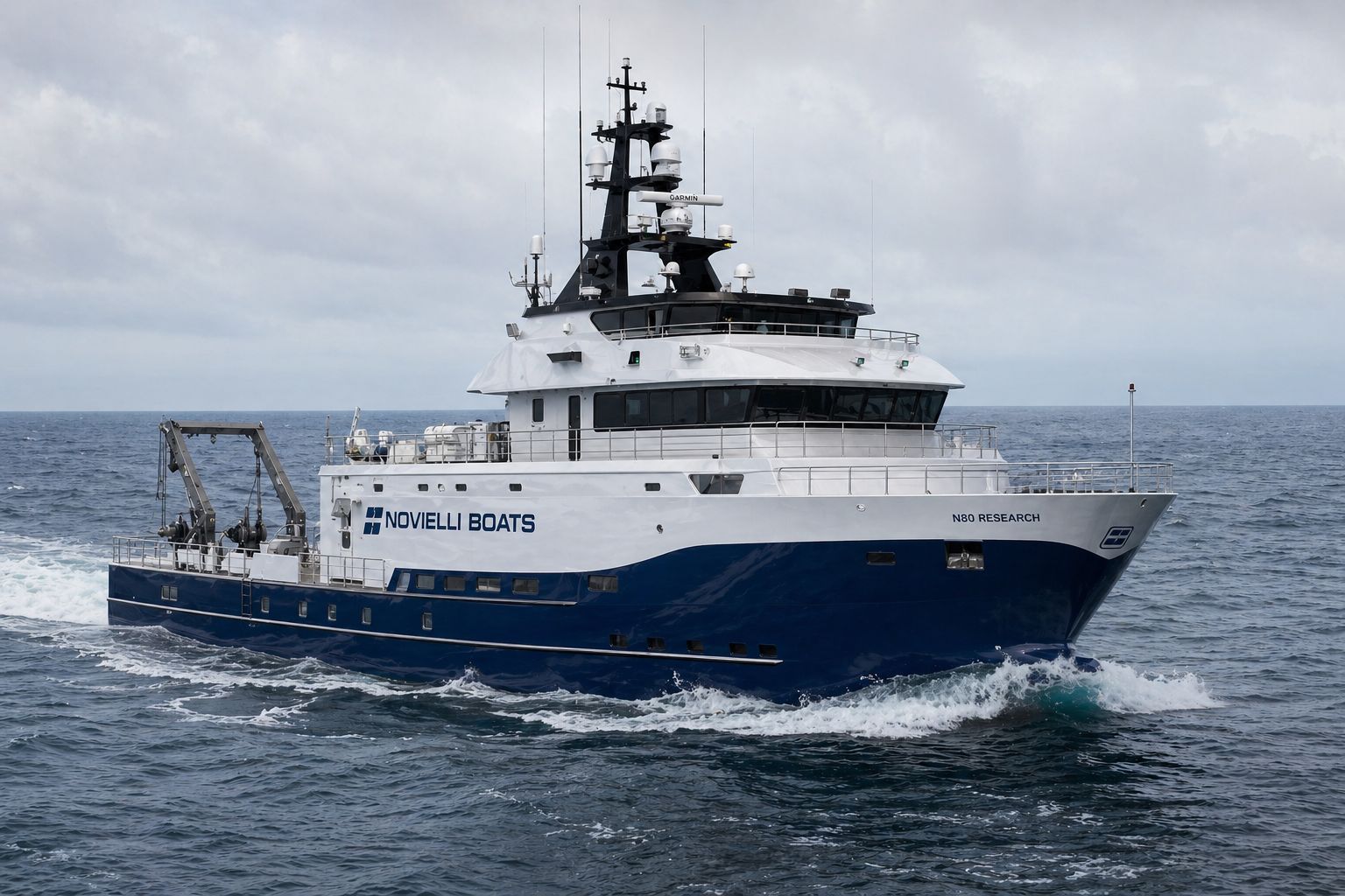 Novielli N80 research vessel underway on open ocean under overcast skies.