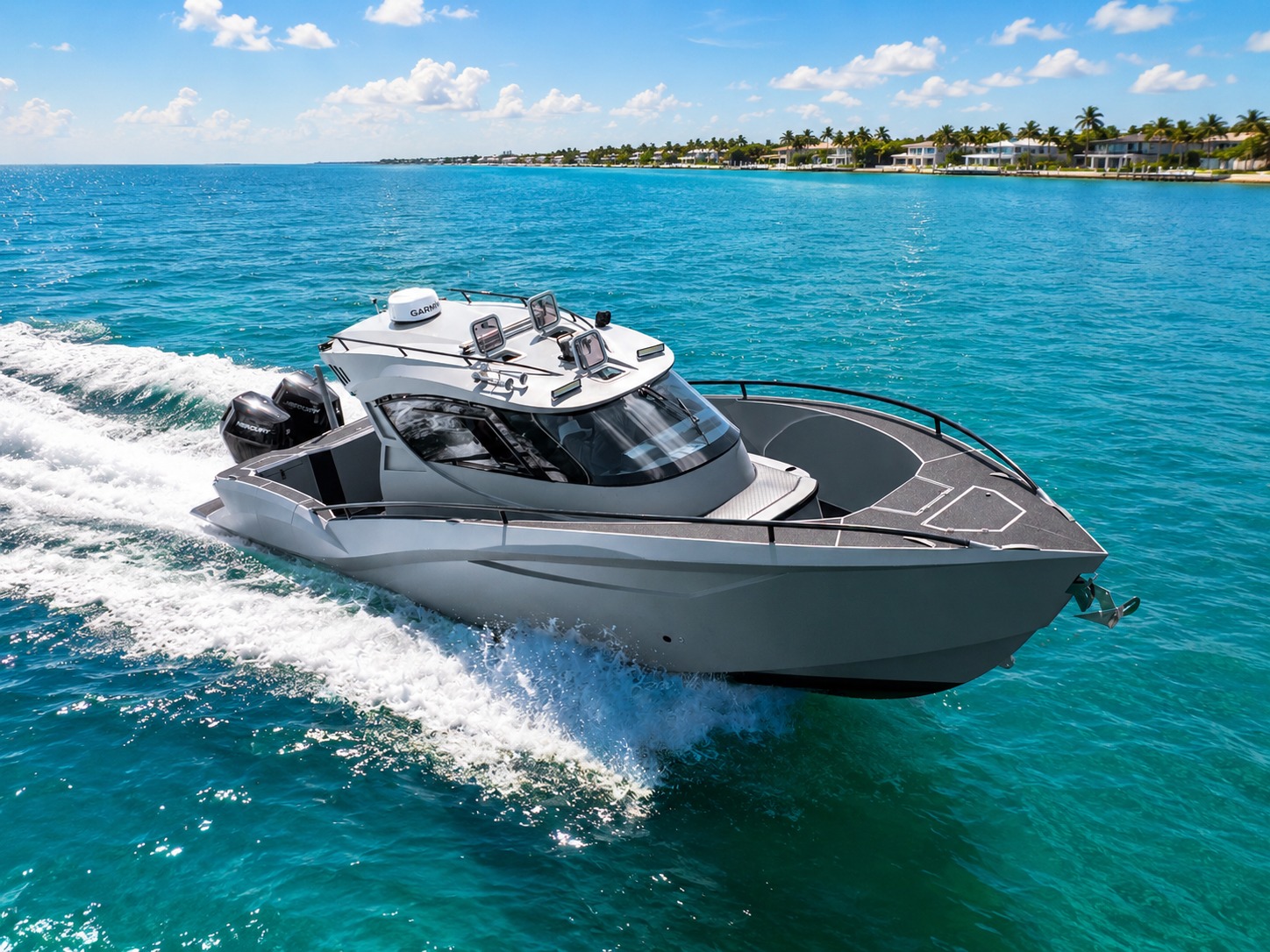 Novielli gray cabin patrol boat with Garmin radar and twin Mercury outboards running at speed past a tropical shoreline with palm-lined estates.