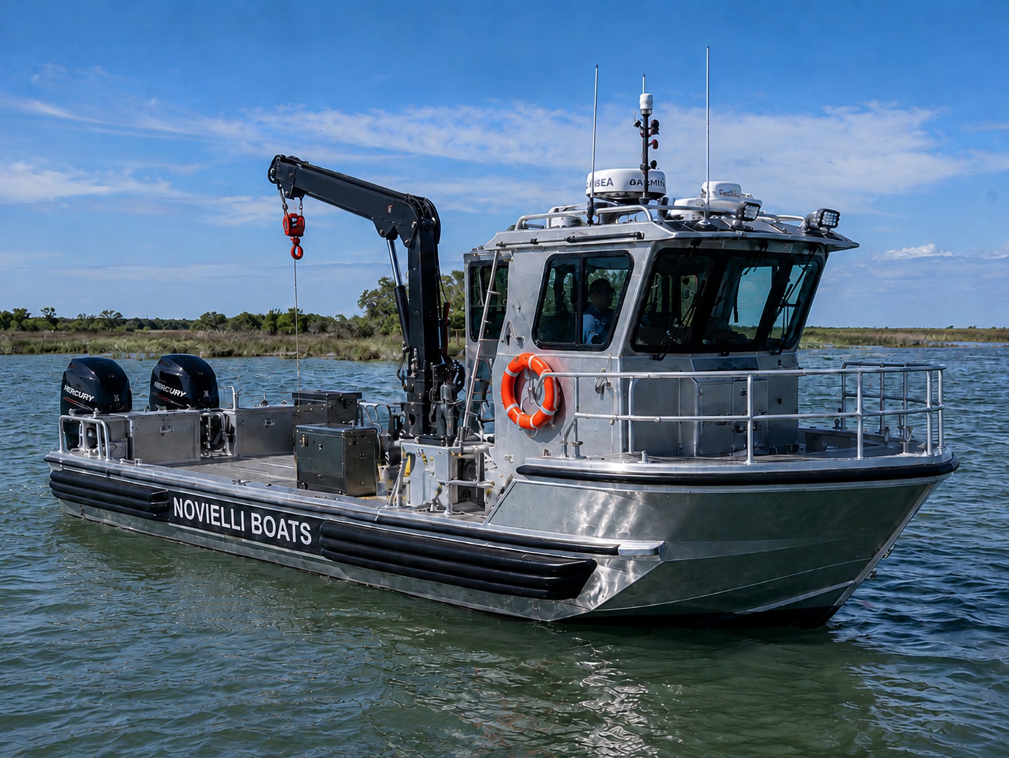 Novielli aluminum workboat with pilothouse and deck crane on calm coastal water.